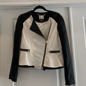 BEBE Black and white peplum jacket
